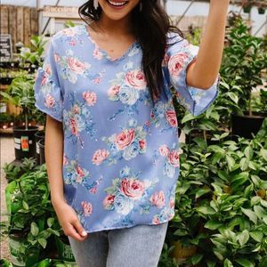 Satin rose blouse in blue. NWOT